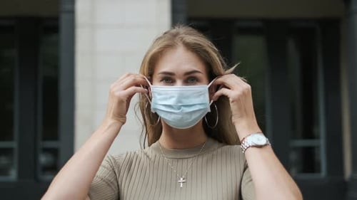 Girl Putting Masks Closeup Italy Street Coronavirus. Lady Near Theater Covid-19.