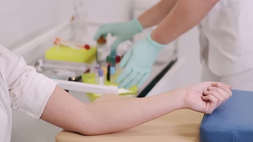 A Laboratory Worker Takes a Blood Sample for Antibodies To the Virus