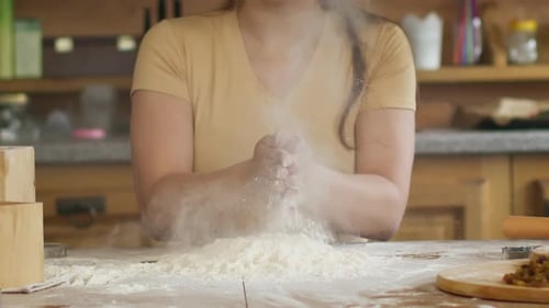 Close Up Female Hands Prepares for Kneading Dough on Table Powdering with Flour