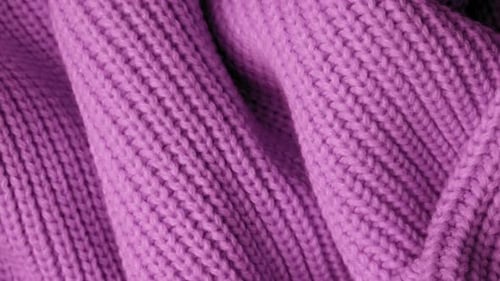 Close-Up of Purple Knitted Fabric with Soft Texture