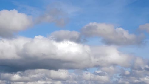 Clouds Flying on Blue Sky