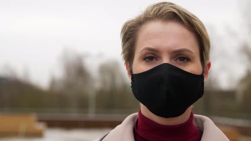 Woman Wearing Protective Reusable Barrier Mask