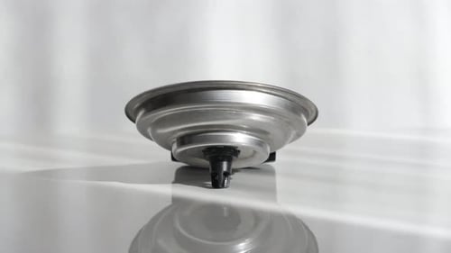 Tilting on coffee machine pod holder 4K video