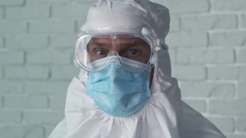 Portrait Male Doctor in Protective Kit Working in Lab. Close-up