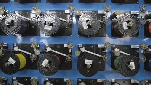 Industrial Machine with Colorful Wiring Spools