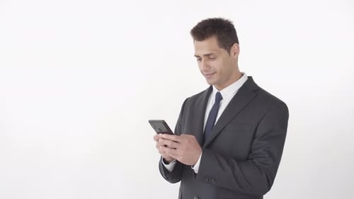 Successful Businessman Using Telephone
