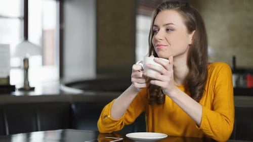 Peaceful Woman Enjoying Coffee Alone in Restaurant, Morning Tradition, Relax
