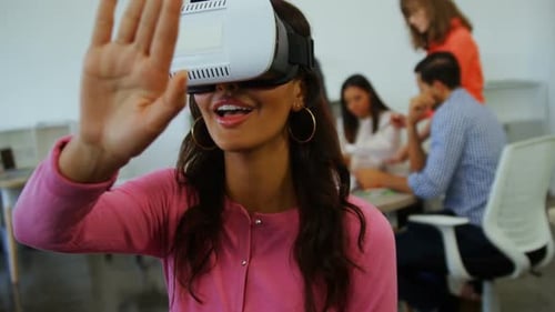 Woman Wearing VR Headset in Office Environment