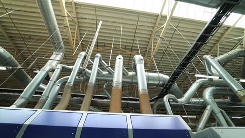 Industrial zone. Steel pipelines, valves, cables and walkways