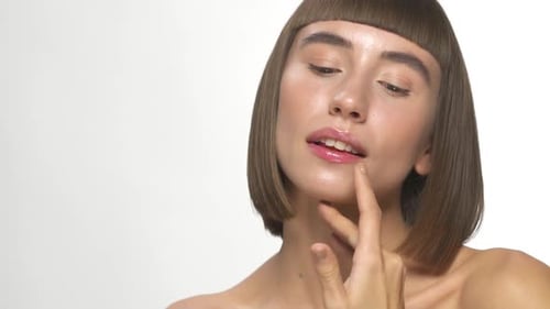 Attractive Young Woman Posing in Studio Environment