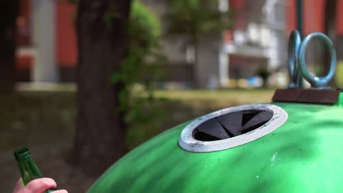 Recycling Empty Glass Bottle in Urban Environment