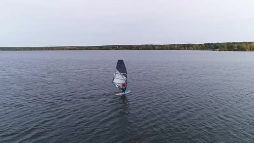 Aerial drone shot of alone windsurfer at big pond 03