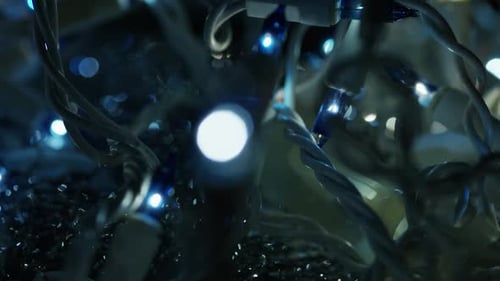 Close up of Blue Christmas Lights and Garland