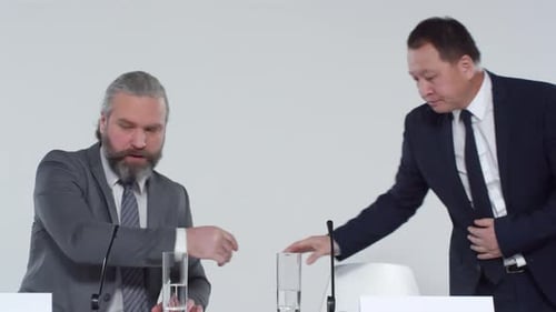 Two People at a Corporate Press Conference