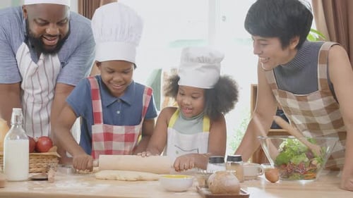 Family Cooking Together at Home