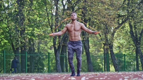 Athlete Doing Exercise at Stadium