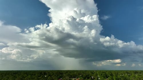 Landscape of Dark Ominous Clouds Forming on Stormy Sky Before Heavy Thunderstorm Over Rural Town
