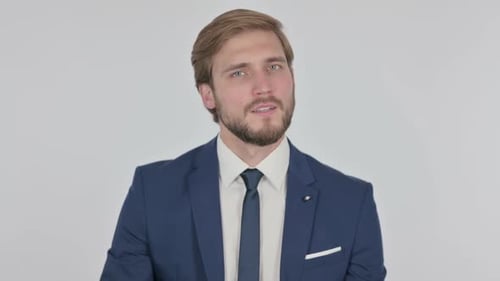 Young Adult Male in Suit Looking at Camera