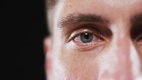 Close up portrait of face of caucasian man with focus on eye