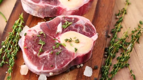Close Up of Raw Meat on Chopping Board on a Chopping Board