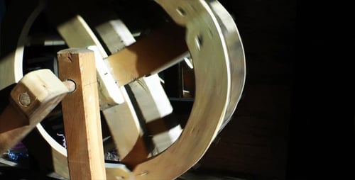 Wooden Hand Crank Wheel Spinning Close Up