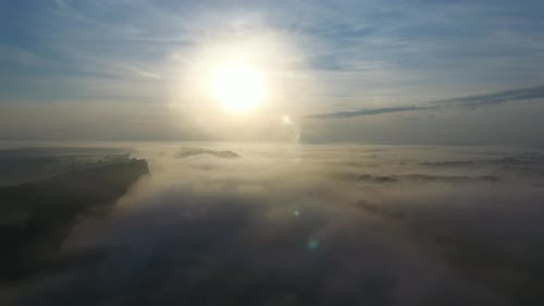 Flight Over the River in the Fog at Dawn
