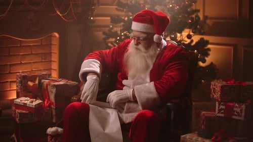Santa Reading List and Inspecting Christmas Presents
