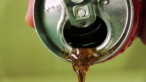 Refreshing Soda Can Pouring Liquid Close-Up