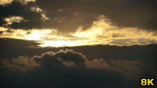 Golden Light Breaking Through Stormy Sky