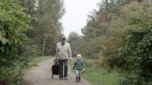 Senior Adult and Child Walking on Path
