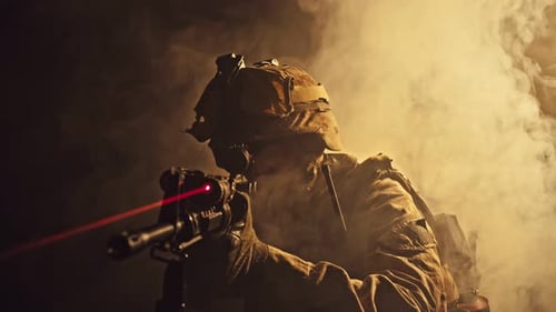 US Marine Soldier Aiming with Rifle at Night in Darkness