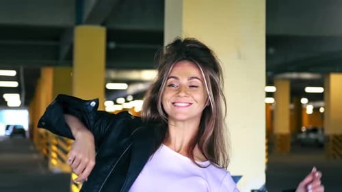 Stylish Woman Posing in a Parking Garage