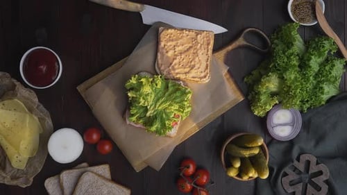 Sandwich Preparation with Fresh Ingredients Overhead