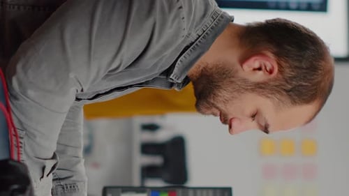 Man Working in an Office, Vertical Video