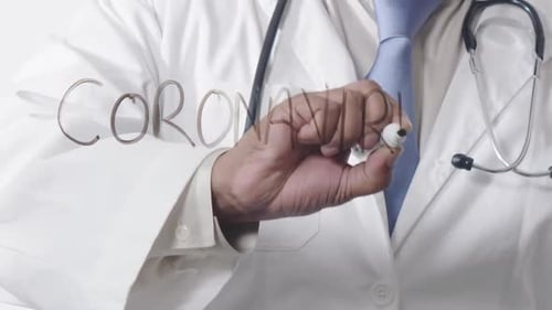 Doctor Writes Coronavirus Medical Concept Close Up
