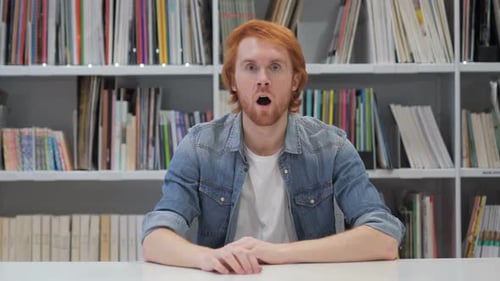 Amazed Surprised Man with Red Hairs Wondering