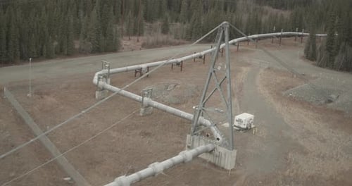 Helicopter aerial shot of dock and ocean, day