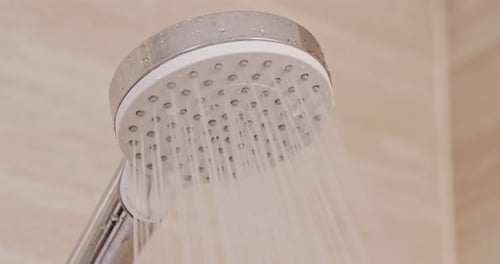 Water Flowing from a Modern Shower Head