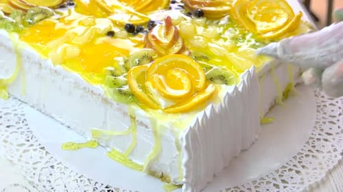 Delicious Cake Decorated with Orange and Kiwi Slices