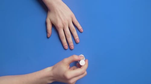 Applying Clear Nail Polish, Top Down View