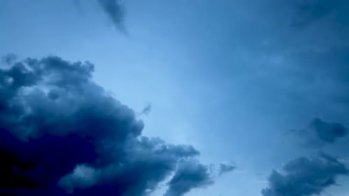 Building motions clouds. Puffy fluffy white clouds sky time lapse. slowing clouds. B Roll Footage Cl