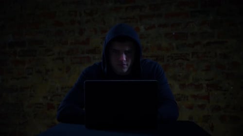 Hacker using computer
