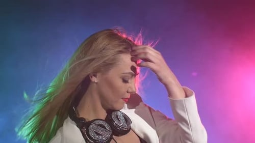 Beautiful, Charming, Dj Girl in White Jacket, Wearing Headphones, Listening Music and Dancing, Enjoy