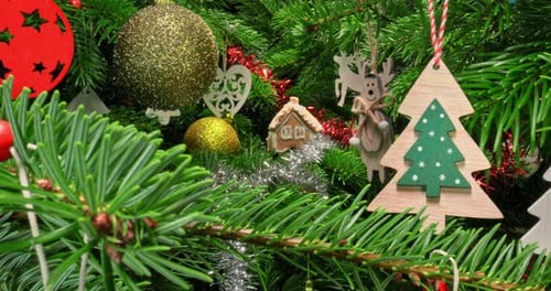 View from inside of traditional green Christmas tree. Parallax effect.
