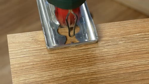 Jigsaw Cuts Piece of Wood