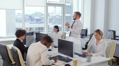 Businessman Doing Gymnastics in Office