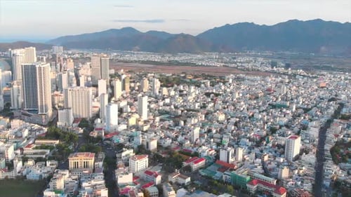 Drones Aerial Take a Beautiful View of the Big City From a Bird's Eye View with Skyscrapers or Tall