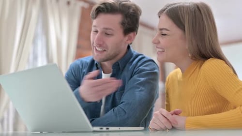Attractive Office Colleagues Doing Video Chat on Laptop in Bedroom