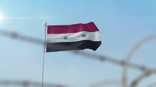 Syria Flag Waving Behind Barbed Wire Fence
