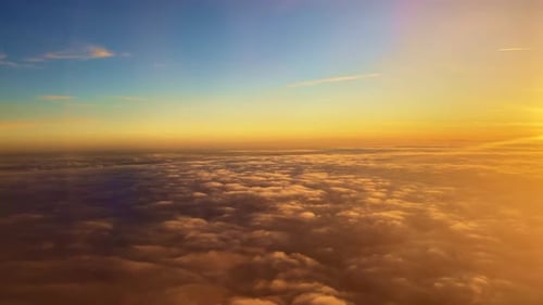 Golden Sunrise Above Cloudscape Aerial View